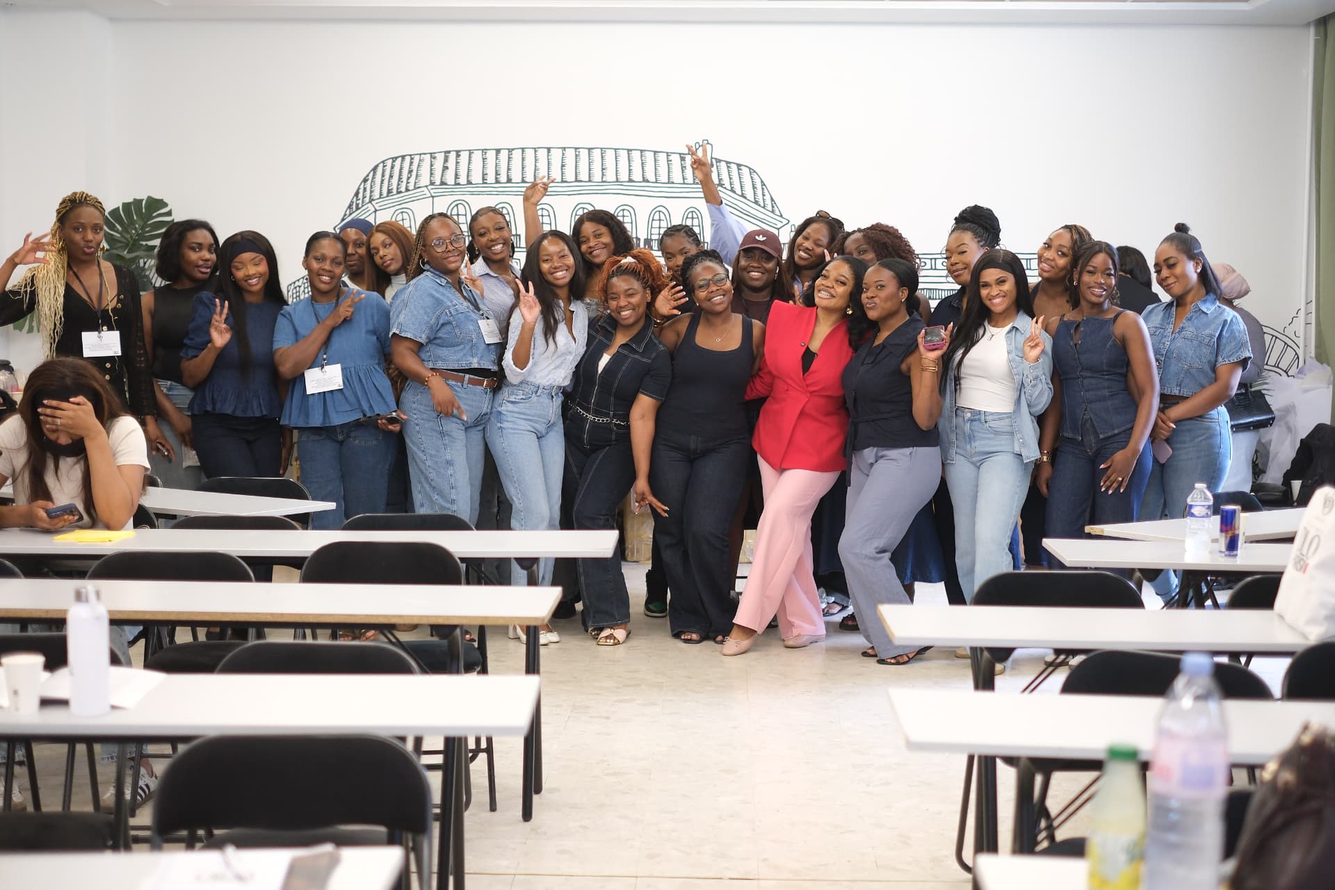 Omoye with a full class of Glam By Omoye students